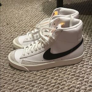 White and Black High-Top Sneakers